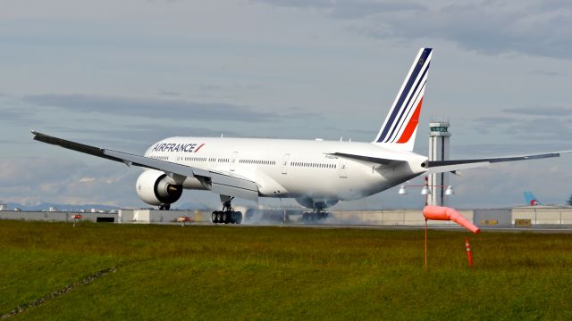 BOEING 777-300 (F-GZNQ) - BOE36 landing on Rwy 34L to complete a C1 flight on 5/1/15. (ln 1298 / cn 40064).