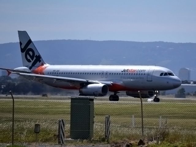 Airbus A320 (VH-JQG) - On taxi-way, heading for take off on runway 05.