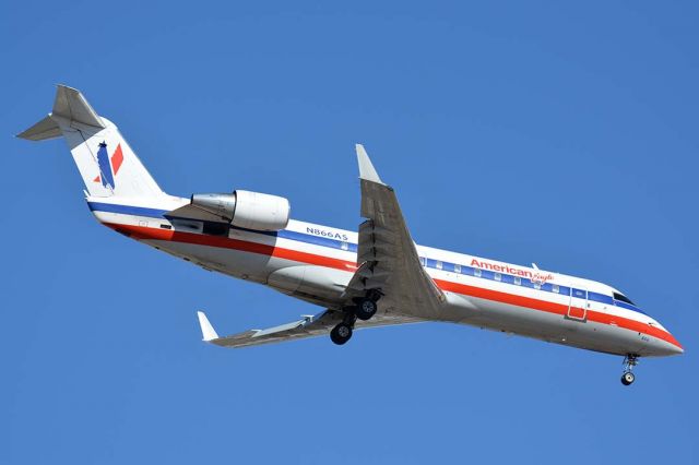Canadair Regional Jet CRJ-200 (N866AS) - American Eagle Canadair CL-600-2B19 N866AS at Phoenix Sky Harbor on January 26, 2016. It is operated by Expressjet Airlines. It first flew as C-FMML. Its construction number is 7517. It was delivered to Atlantic Southeast Airlines on June 15, 2001. It was leased to Comair on June 29, 2005 and then to Skywest Airlines on November 2, 2005. It was acquired by Expressjet Airlines on February 24, 2012. 