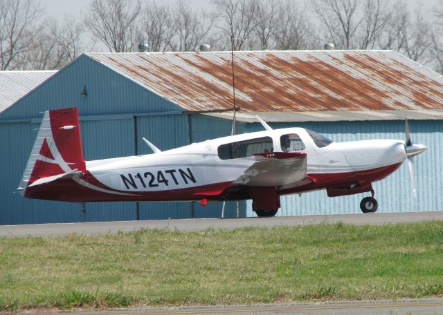 Mooney M-20 (N124TN) - Starting to roll down runway 14 at the Shreveport Downtown airport.