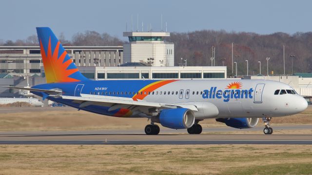 Airbus A320 (N241NV) - December 2, 2018, Nashville, TN -- Allegiant 857 departing Nashville bound for KPIE with its freshly painted tail (ex tail# EC-HHA from Iberia, Clickair, and Vueling). This photo was taken at the Vultee Blvd OBS Lot.