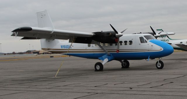 De Havilland Canada Twin Otter (N166DH) - A 1967 model DeHavilland Canada DHC-6 Twin Otter on the ramp under overcast at Carl T. Jones Field, Huntsville International Airport, AL - November 23, 2018. 