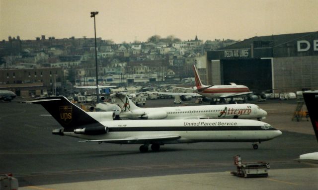 BOEING 727-200 (N213UP) - From April 1999 - UPS B727-200 departing Boston Logan with some other oldies but goodies in back. The UPS B727-200F was rare at BOS. 