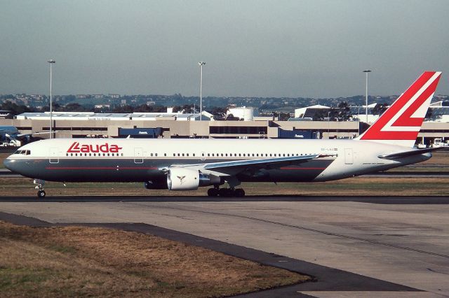 Airbus A320 (OE-LAU) - LAUDA AIR - BOEING 767-3Z9/ER - REG OE-LAU (CN 23765/165) - KINGSFORD SMITH SYDNEY NSW. AUSTRALIA - YSSY 27/6/1988 35MM SLIDE CONVERSION USING A LIGHTBOX AND A NIKON L810 DIGITAL CAMERA IN THE MACRO MODE.