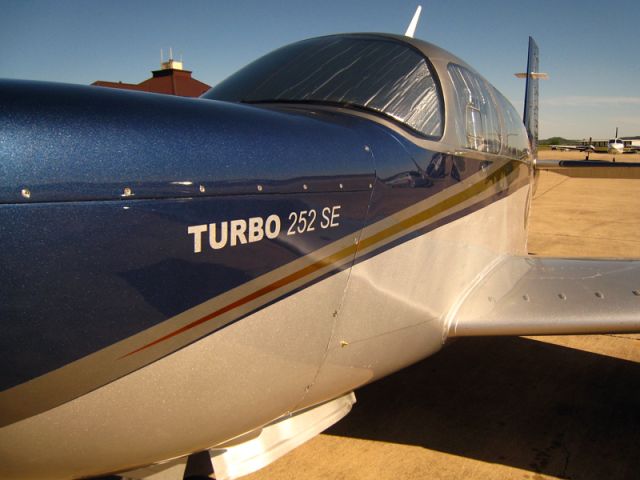 N252Q — - M20K/252 airplane on ramp w/picture of left front.