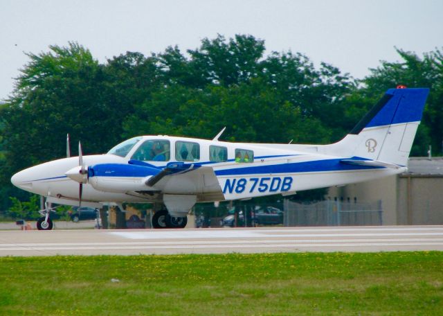 Beechcraft Baron (58) (N875DB) - At Oshkosh. 1980 Beech 58 Baron