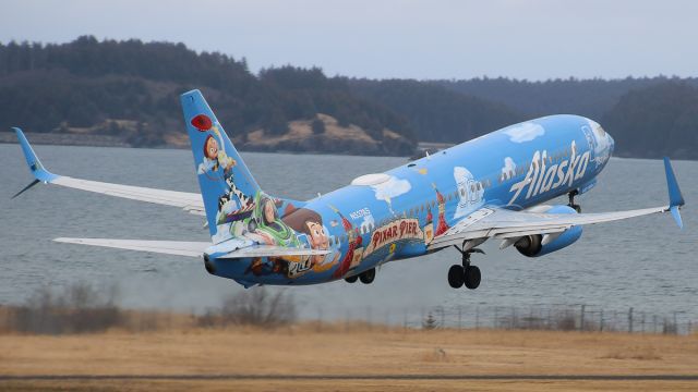 Boeing 737-800 (N537AS) - Alaska Airlines ASA/AS88 to Anchorage (PANC/ANC) in the "Pixar Pier" livery departing after a medical emergency delaybr /Photo date: 4/25/24br /Upload date: 11/1/24