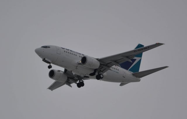 BOEING 737-600 (C-GXWJ) - On final into YYC from YVR