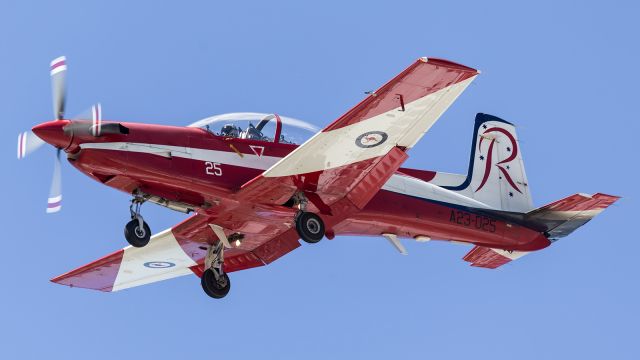 — — - This RAAF PC9, normally part of the Australian Roulette Aerobatic Team, returns from a sortie, undertaken in conjunction with the US Navy F-18 Super Hornets, during their 3 week stay in Townsville.