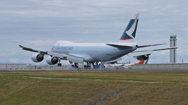 BOEING 747-8 (B-LJI) - BOE559 touches down on runway 34L to complete a flight test on 8/23/12. (LN:1460 c/n 39247)