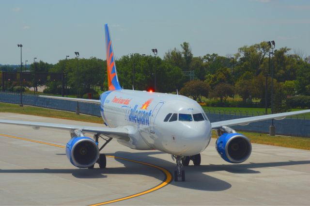 Airbus A319 (N304NV) - Allegiant 48 from Las Vegas is taxing into Gate A10 at Omaha Eppley Airfield at 12:56 PM on July 27, 2018.  Photo taken with Nikon D3200 mourning 55-200mm VR lens.