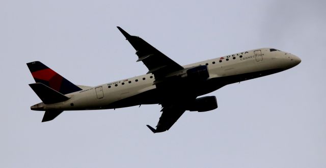 Embraer 175 (N614CZ) - Compass Airlines, Operating as Delta Connection, Departing off 12R to LAS.  01-02-2017