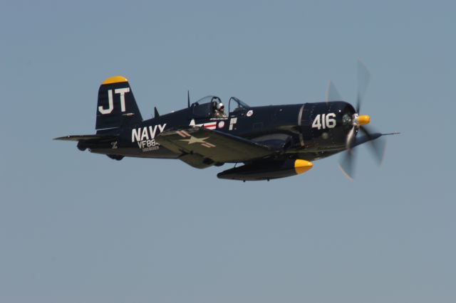 — — - Slightly Blurred F-4U Corsair on Take-Off at the EAA 2011