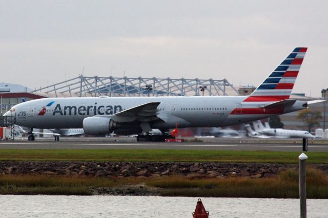 Boeing 777-200 (N751AN) - American B777-200 with "75 - American Airlines Salutes AZRIEL "AL" BLACKMAN on 75 years of service" marking on left side of the aircraft arriving to BOS from MIA on 10/09/21.