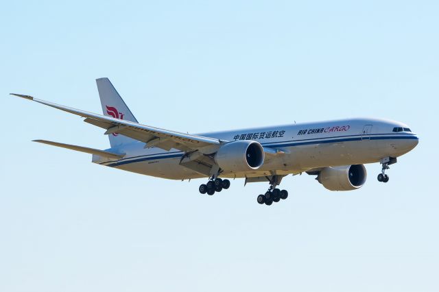 Boeing 777-200 (B-2095) - 08/13/2015 Air China Cargo B-2095 B77-FFT KDFW - Backlit. Morning shot.