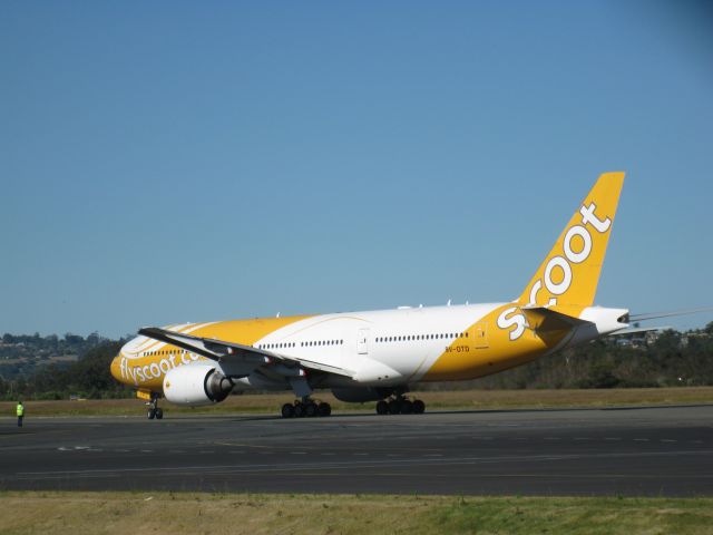 Boeing 777-200 (9V-OTD) - A Brand new scooter machine sits on the tarmac getting ready to taxi to RWY 14