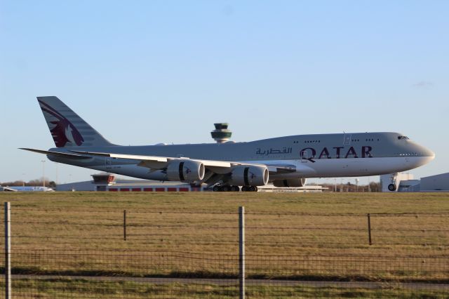 BOEING 747-8 (A7-HHF) - A Qatar Amiri Flight B747-800 BBJ slowing down after landing on runway 22 at STN.br /br /Location: Stansted Airport.br /Date: 26.12.22 (dd/mm/yy).