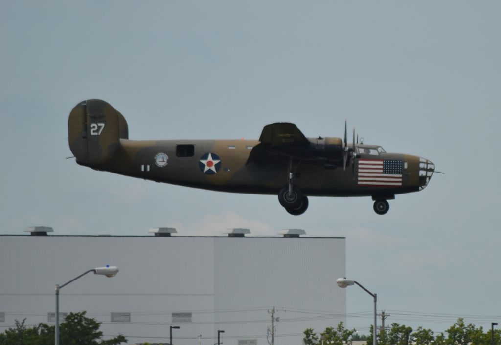 Consolidated B-24 Liberator (N24927) - N24927 Consolidated B-24 "Diamond LIL" landing in Sioux Falls SD on 08-12-2013