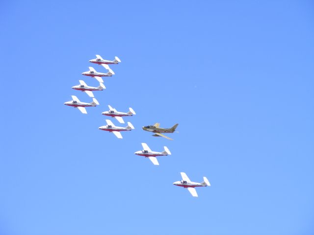 SDR114009 — - the snowbirds fly in formation with f-86(Hawk 1) during fly past at CFB Trenton.