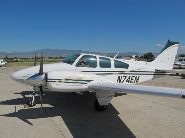 Beechcraft 55 Baron (N74EM) - N74EM at the general aviation ramp in Port au Prince, Haiti with Cameron King at the controls.