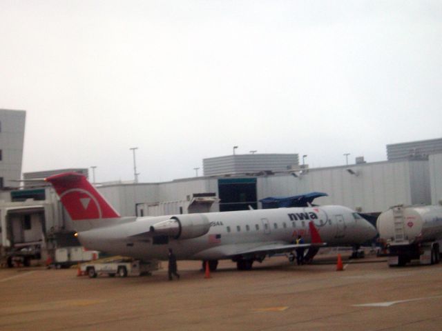 Canadair Challenger (N8914A) - A bit grainy. CRJ-440 getting fuel for another hop. March 15th, 2008.