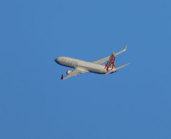 — — - Afternoon departure off runway 14R, left turn to track to Onagi waypoint, then Melbourne.