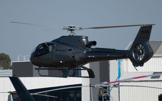 Eurocopter EC-130 (VH-XKK) - Professional Helicopter Services lifting off the helipad for a short tour around Melbourne