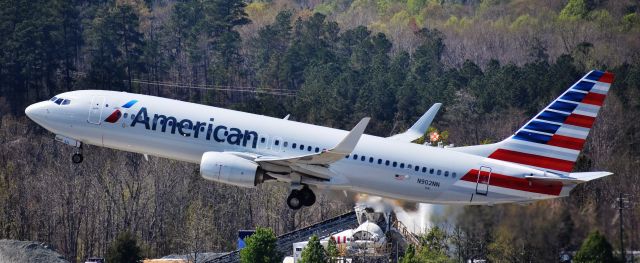 Boeing 737-800 (N902NN) - Another shot of N902NN - take a look behind it, though - that temporary concrete batch plant is a sign of RDUs future expansion.  Exciting times! On 4/12/18.