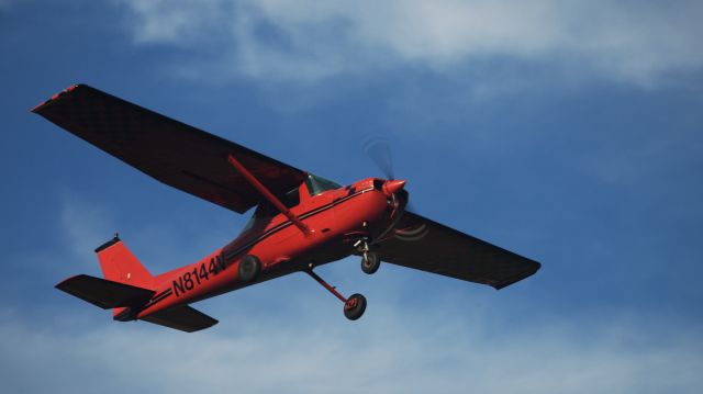 Cessna Commuter (N8144V) - An Aerobat from the FBO across the runway from me, taking off for the practice area