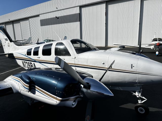 BEECH 58P Pressurized Baron (N726BA) - Pilot side window right before she slips in her new Hanger till a work day