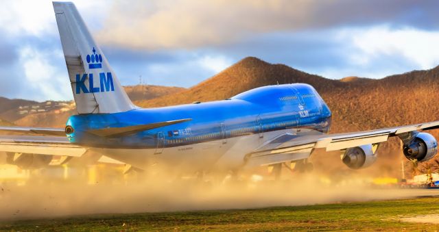 Boeing 747-400 (PH-BFT) - KLM PH-BFT seen departing TNCM St Maarten at sunset while blowing the runaway clean!!