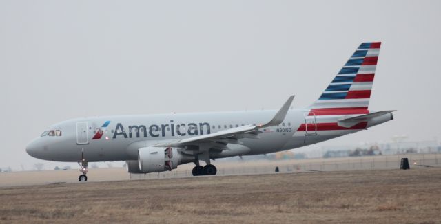 Airbus A319 (N9015D) - 030514 from KDFW, landing Rwy 1L. Thrust reversers employed