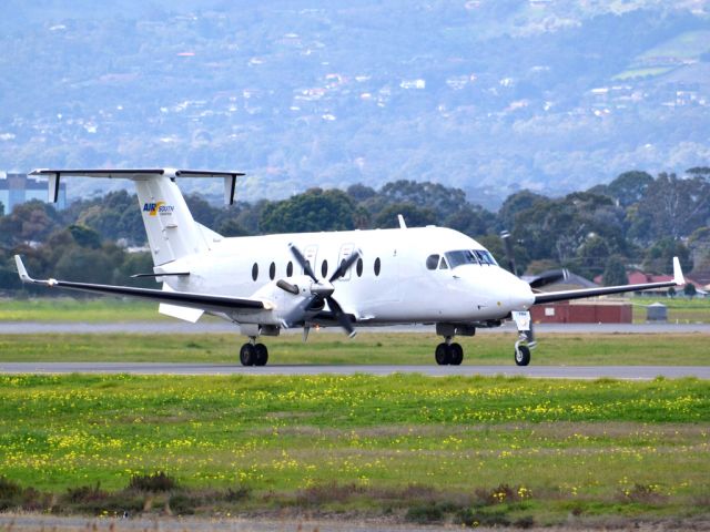 Beechcraft 1900 (VH-YOA) - On taxi-way heading for take off on runway 05. Thursday 12th July 2012.