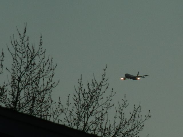 Airbus A300F4-600 (N729FD) - The Beast From Memphis Flying Toward The Camera As The Sunset Causes Red/Orange To Glow On The Wings