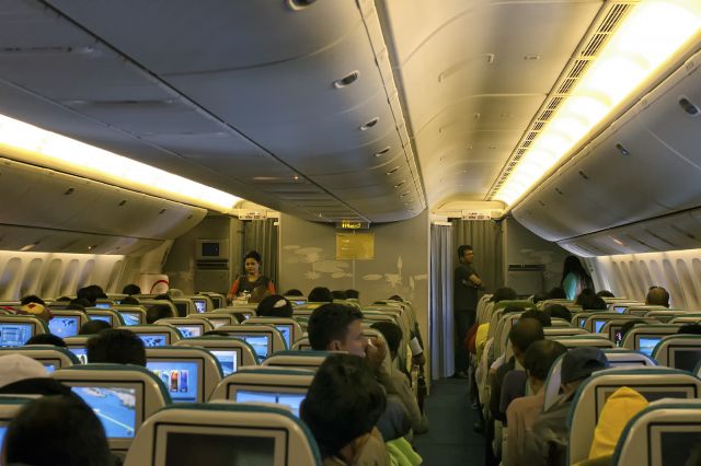 BOEING 777-300 (S2-AHM) - 1st Jan., 2016.  View of economy class cabin with 3-3-3 seat configuration.  Shot taken during the flight from Kuala Lumpur to Dhaka.