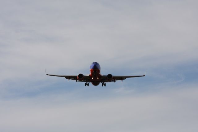 Boeing 737-700 — - A Southwest plane in the skies over KSMF.