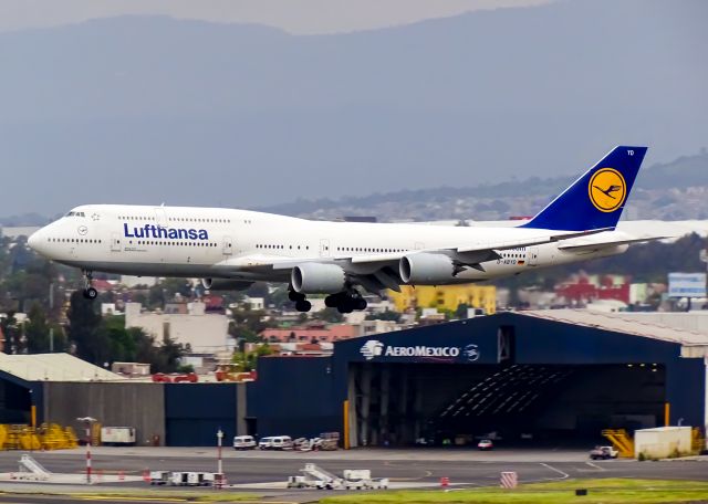 BOEING 747-8 (D-ABYD) - Queen Of The Skies! Landing In Mexico City Airport With Aeromexico Hangar Behind