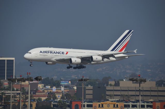 Airbus A380-800 (F-HPJG) - Short-final to Runway 24R, from a parking garage southeast of the 24s.  