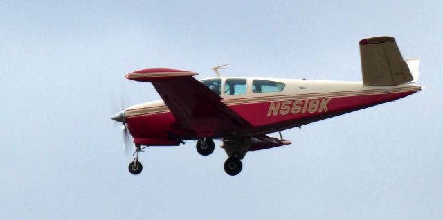 Beechcraft 35 Bonanza (N5618K) - About to touch down is this 1964 Beech S35 Bonanza on New Years Eve 2024.