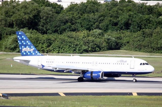 Airbus A320 (N706JB) - JetBlue Flight 27 (N706JB) arrives on Runway 1L at Tampa International Airport following a flight from John F Kennedy Interantional Airport