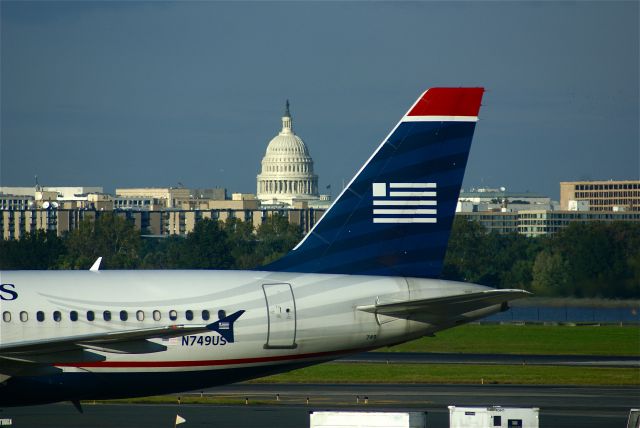 Airbus A319 (N749US) - U.S. Airways A319 parked with capitol in the background.