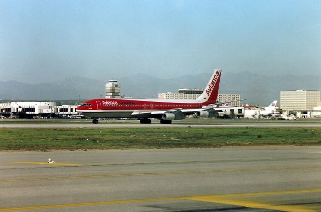 Boeing 707-100 (HK-2016) - KLAX - -2016 landing 25L at Los Angeles in March 1989.