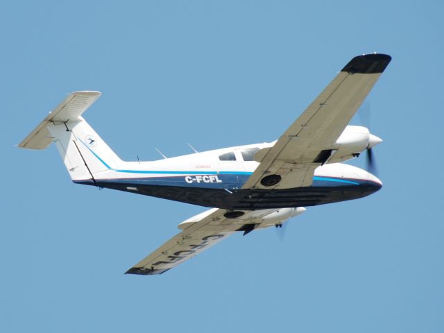 Piper PA-44 Seminole (C-FCFL) - Toronto Airways - flight school Piper Seminole departing Buttonville Airport. April 30/10.