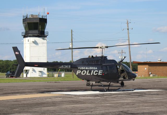 Bell JetRanger (N63KS) - A Bell OH-58A Kiowa, operated by the Tuscaloosa Police Department, spooling up at Tuscaloosa Regional Airport, AL - late afternoon, June 25, 2021. 