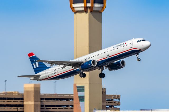 Airbus A321 (N578UW) - An American Airlines A321 in US Airways retro livery taking off from PHX on 2/3/23. Taken with a Canon R7 and a Tamron 70-200 G2 lens.