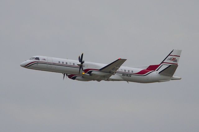 Saab 2000 (N519JG) - Joe Gibbs Saab 2000 departs 7L after the 500.