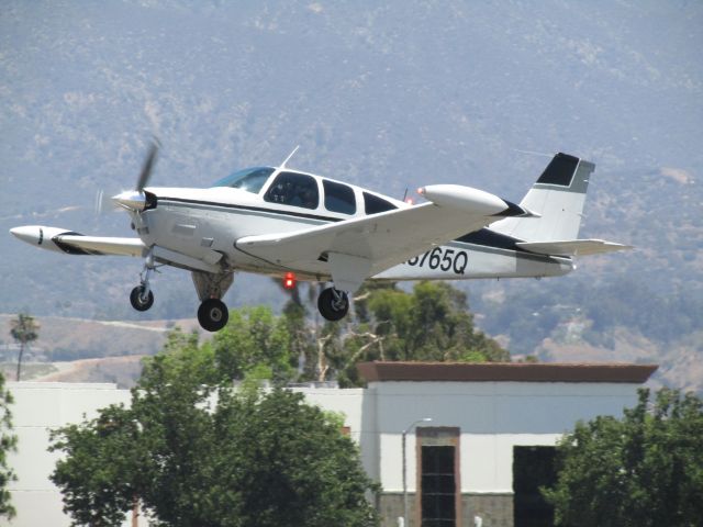 Beechcraft Bonanza (33) (N3765Q) - Taking off RWY 26L