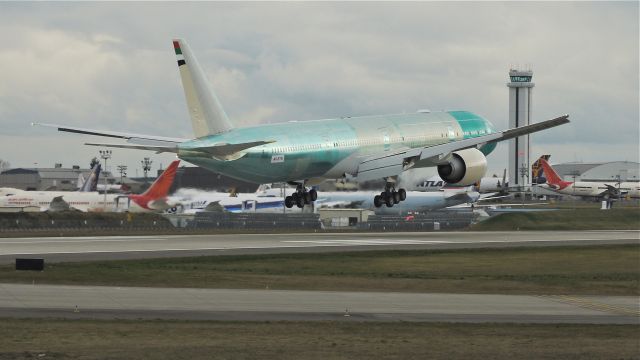 BOEING 777-300 (A6-ETN) - BOE264 on final approach to runway 16R to complete its maiden flight on 3/1/13. (LN:1086 cn 39689).