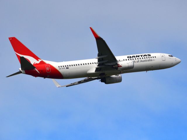 Boeing 737-800 (VH-VYF) - Getting airborne off runway 23 on a cold, gloomy winters day. Wednesday 4th July 2012.