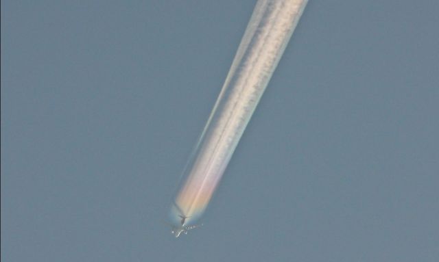 Airbus A330-200 (VH-EBG) - Qantas flight 108, enroute John F. Kennedy Intl – Los Angeles Intl, climbs trough a cloud layer displaying a great “rainbow trail”